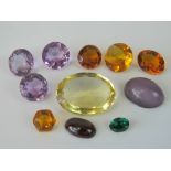 Gemstones; A large oval faceted citrine approx 1.8 x 2.