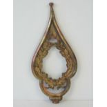 A cast brass WWII German teardrop banner top decorated with oak leaves, 22cm in length.