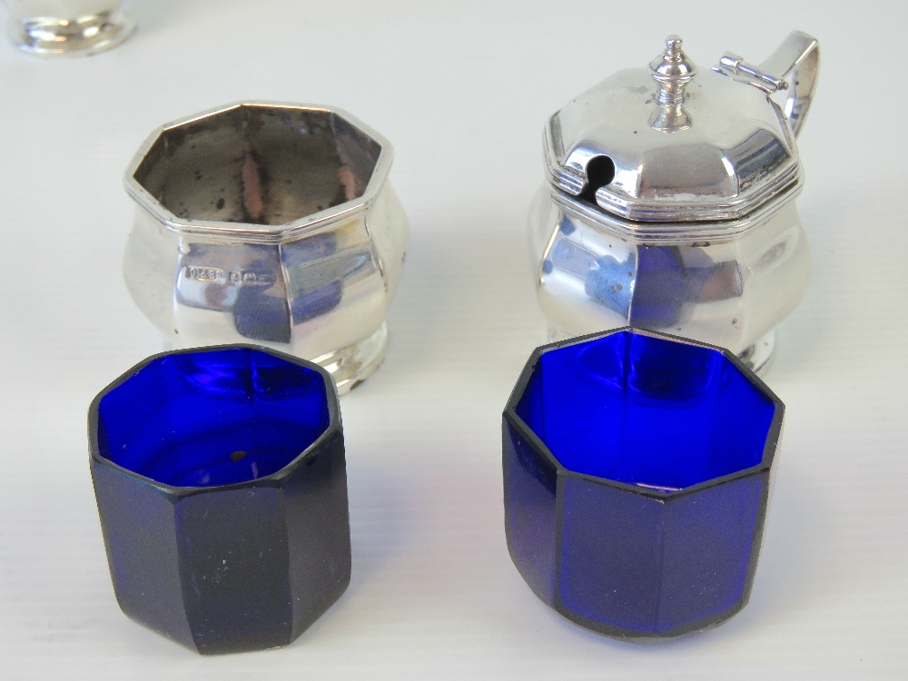 An octagonal HM silver cruet set comprising pepperette, salt with blue glass liner, - Image 3 of 4