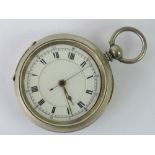 A pocket watch movement having white enamel dial with Roman numerals,