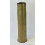 An inert WWI Imperial German 105mm brass shell, dated 1912 with Naval marks, standing 50.5cm high.