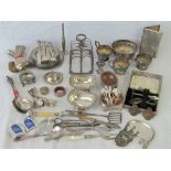 A quantity of assorted 19th and 20th century silver plated tablewares including salts, toast rack,