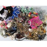 A quantity of assorted costume jewellery and watches including a vintage two strand French jet