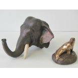 A bronze patinated figurine of a sea lion marked 'A. Miller C.F.A.', 7.5cm high.