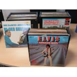 A quantity of records within three carry cases; easy listening, country, classical, etc.