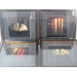 A set of four framed and mounted photographic prints of books, each frame measuring 45.5cm sq.