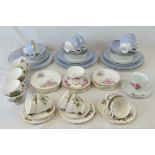 A Doulton dinner service comprising cups, saucers, bowls, side plates and dinner plates.
