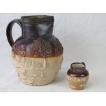 A small Royal Doulton Lambeth stoneware jug marked 'Blackgang' and standing 8cm high,