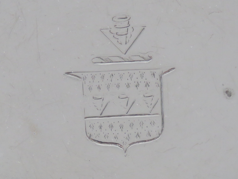 A Georgian HM silver salver raised over three shaped feet, - Image 2 of 3