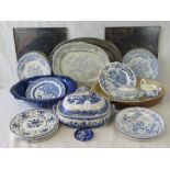 A collection of Victorian and later transfer printed blue and white pottery including meat dishes