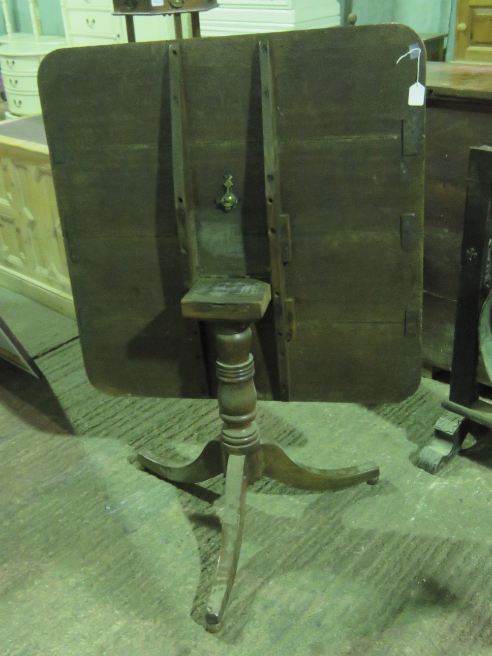 A square shaped four panel tilt top table raised over three outswept feet, 92cm wide, - Image 3 of 3