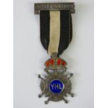 Masonic Regalia; a Knight Commander YHL silver and enamel medal complete with ribbon,