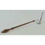 A HM silver candle snuffer having turned wooden handle, hallmarked London 1977,