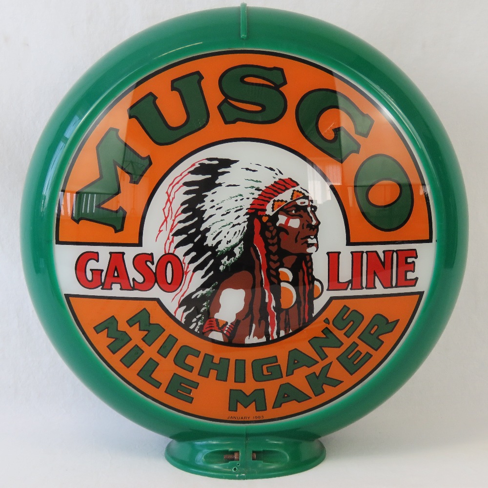 A Musgo gasoline pump globe having green