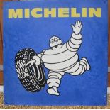 A vintage aluminium advertising sign for