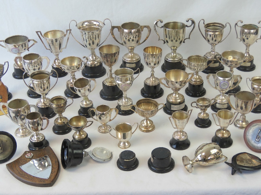 A large collection of silver plated trop