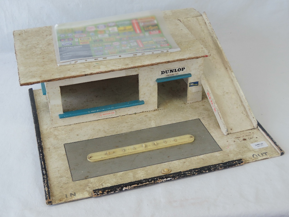 A c1970s childs toy garage complete with