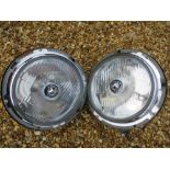 A pair of Lucas PF700 NOS headlights for