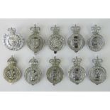 Ten police cap badges bearing Kings and Queens crowns variously including; Leeds City, Kent,