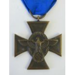 A WWII German Police medal with ribbon.