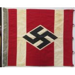 An original WWII German Third Reich trumpet banner bearing swastika and having silver thread fringe