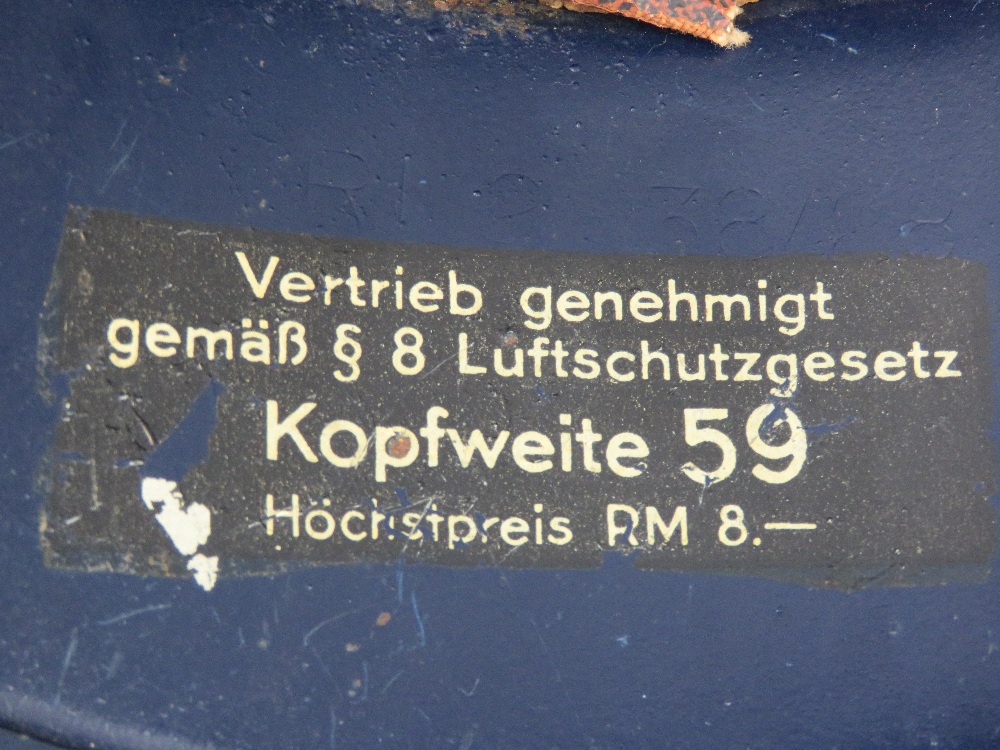 A WWII German Luftschutz helmet having single decal to front, label within, - Image 2 of 3