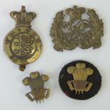 Two Victorian military badges together with two 20th century military badges. Four items.