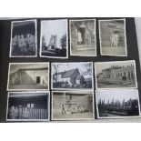 A WWII German Wehrmacht personal photo album including images of training, air raid damage,