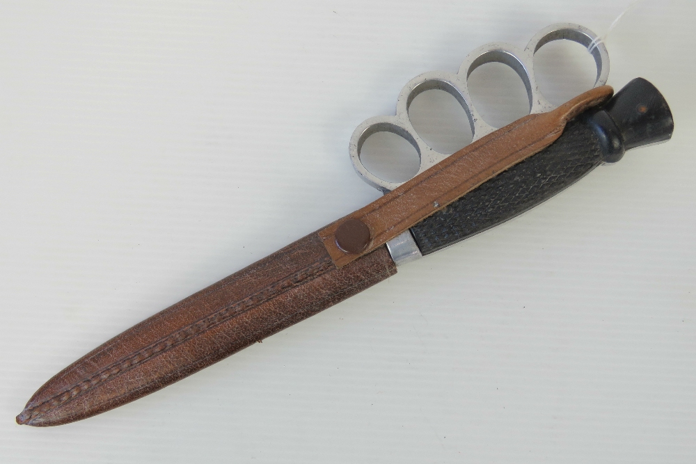 A late 20th century copy of a WWI British Clements trench fighting knife, 24cm in length,