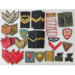 Forty Italian cloth and metal badges, various.