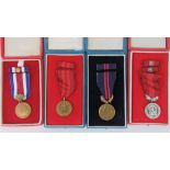 Four Czechoslovakian medals in original boxes.