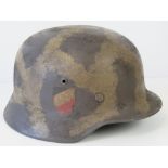 A WWII German Infantry helmet having double decal, original liner and chin strap.