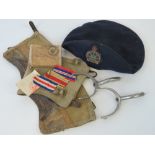 A Canadian Legion British Empire service beret, a pair of canvas gaitors,