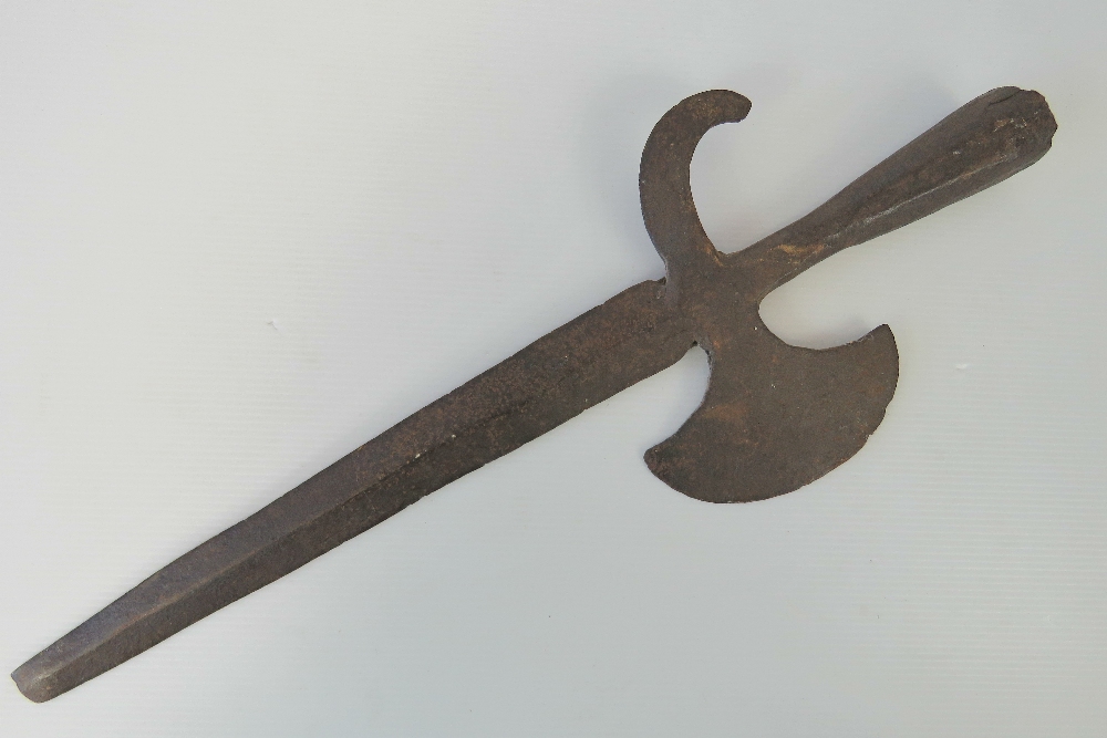 An antique wrought iron halberd spear top with axe head and integral hook, 48cm in length.