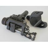 A WWII pintle, traverse and elevation unit for the US military .30 cal Browning machine gun.