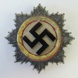 A WWII German 'Gold' Cross award, stamped '1' to pin.