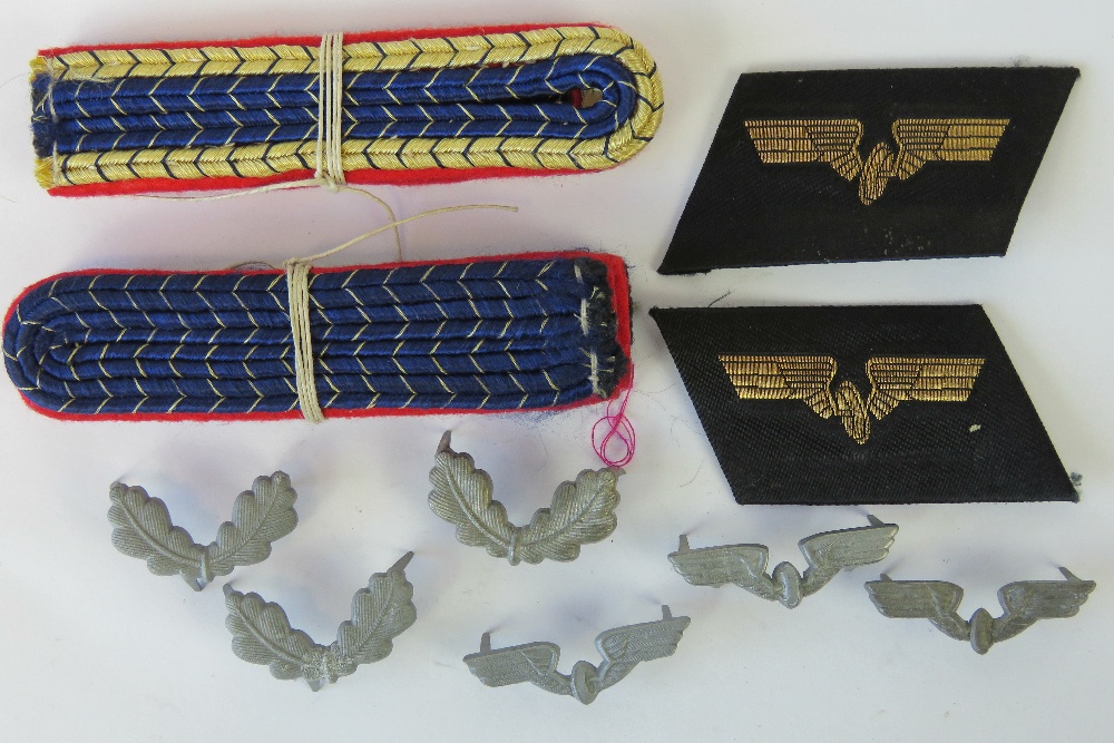 German railway badges; two sets of shoulder boards, a pair of collars and six metal collar badges.