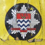 A late 20th century c1970's London Fire Brigade yellow safety helmet bearing LFB insignia and