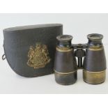 A Victorian artillery officer's leather binoculars case with brass Royal arms crest and fittings