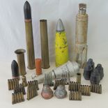 A quantity of assorted inert brass shells, bullet cases, mortar, etc. Twenty-seven items.