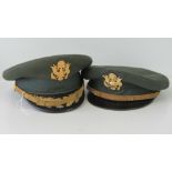 Two US military peaked caps, Vietnam War period, one marked 'Ace Manufacturing Co... Texas'.