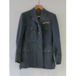 A WWII RAF Pilot Officers tunic complete with brass buttons and wings patch,