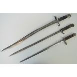 A Yataghan sword bayonet with 58.5cm blade, a B&F HOrster Solingen German bayonet with 52.