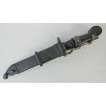 An AK47 bayonet complete with part rubberised scabbard and frog, blade length 20.5cm.