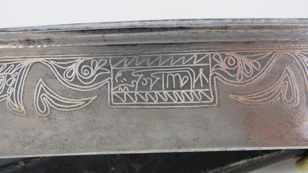 A mid 19thC Turkish Yataghan sword with silver damascened inscribed blade, - Image 5 of 6