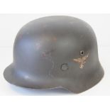 A fine reproduction WWII German Luftwaffe helmet having single decal, liner and chin strap.