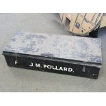 A large black painted military metal trunk marked for J.M. Pollard, 107 x 43 x 26cm.
