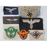 Seven WWII German cloth insignia patches.