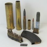 A small quantity of inert shell cases and crimped bullet clips, together with a Bren gun magazine,