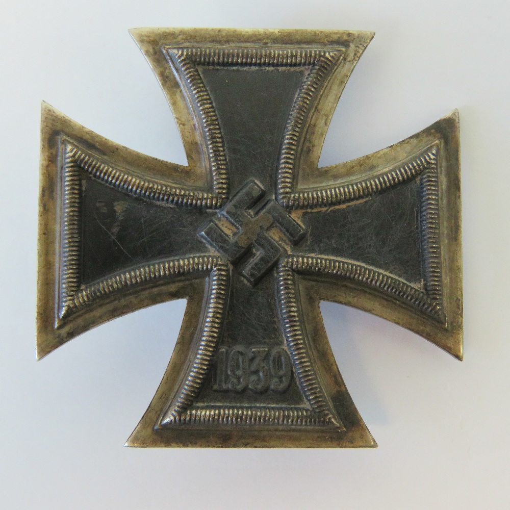A WWII German 1st Class Iron Cross badge stamped '20' to pin.
